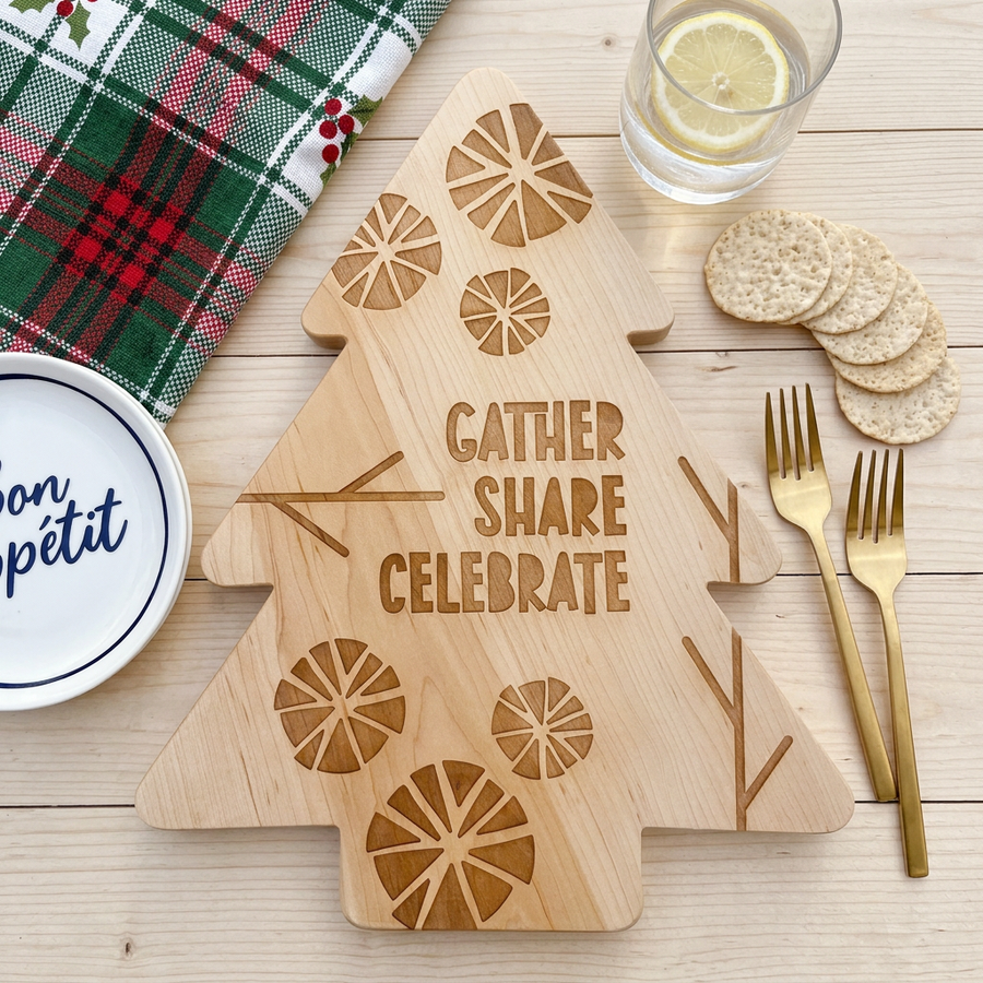Christmas tree-shaped serving board styled with festive table accessories
