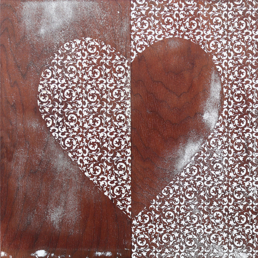 Heart of Filigree art print with a pale ornamental heart against brown wood imagery.