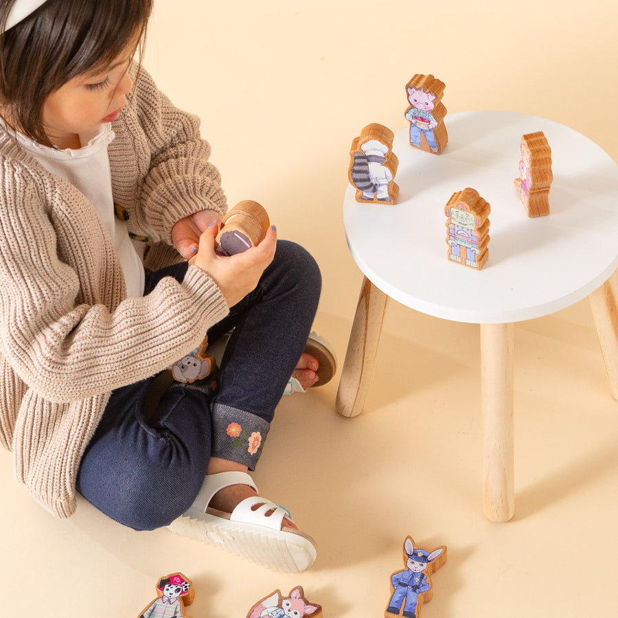 Children using wooden finger puppet characters for storytelling