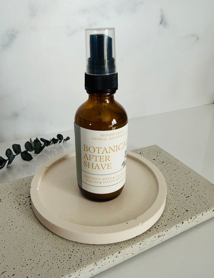 Amber spray bottle of botanical aftershave