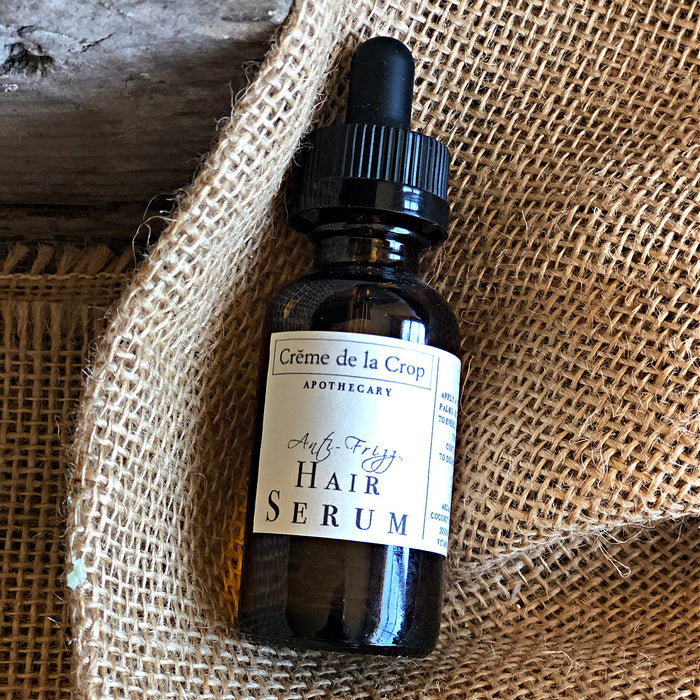 Anti-Frizz Hair Serum with Argan & Jojoba Oils in its labeled container