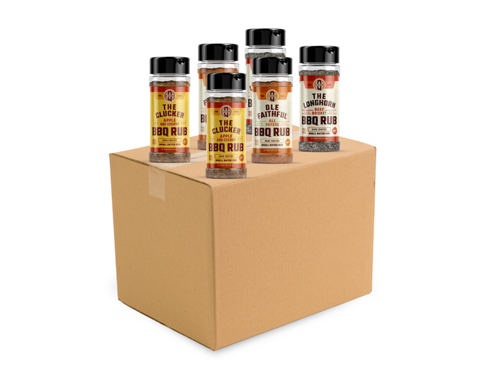 Assorted barbecue rub bottles displayed on a half-case box