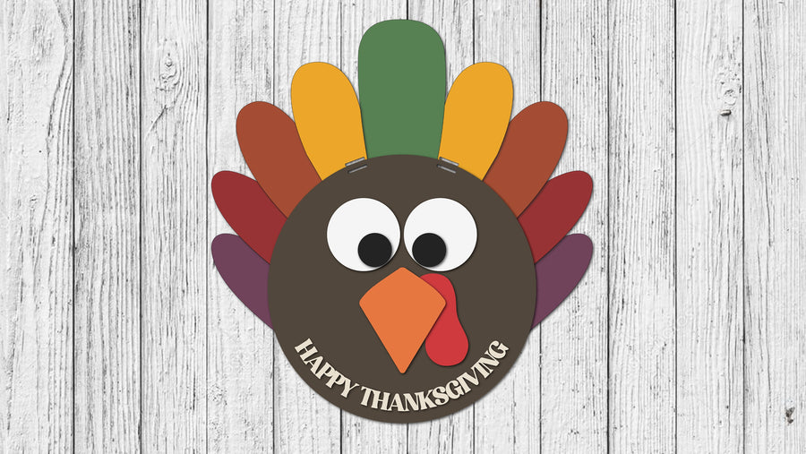 Painted example of a turkey door hanger with colorful feathers