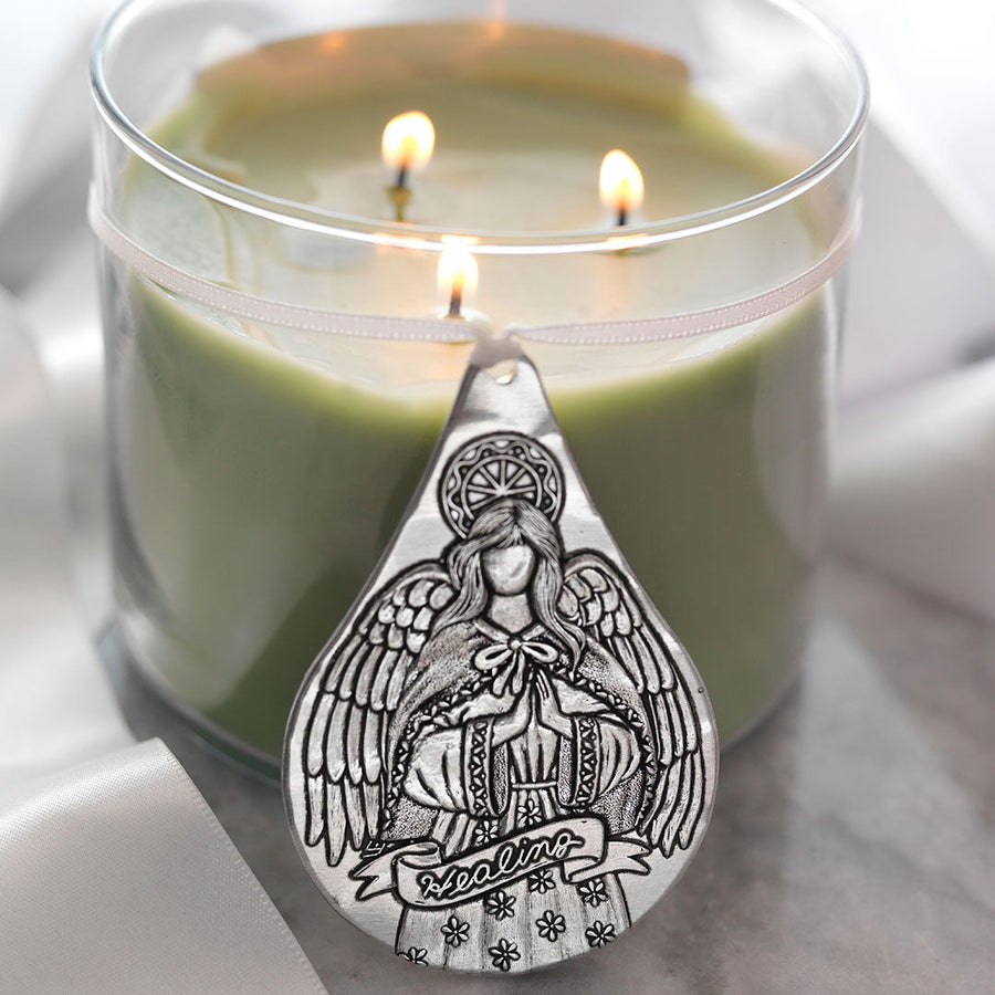 Styled display featuring Healing Angel Teardrop Ornament