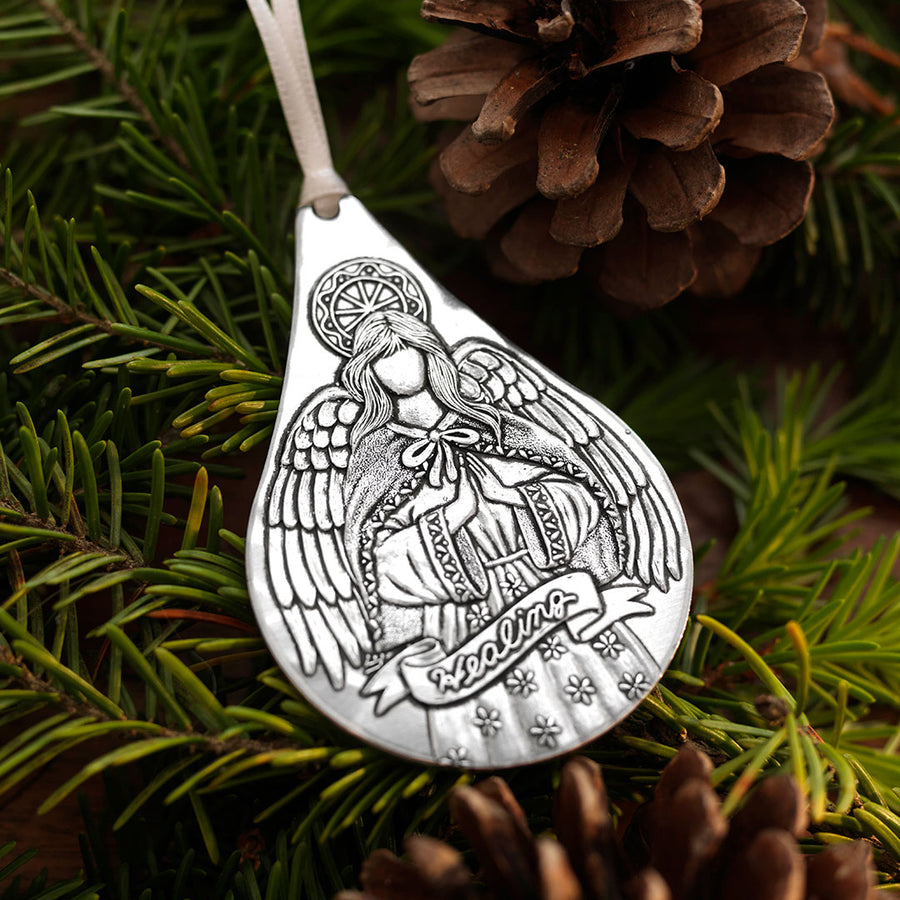 Styled display featuring Healing Angel Teardrop Ornament