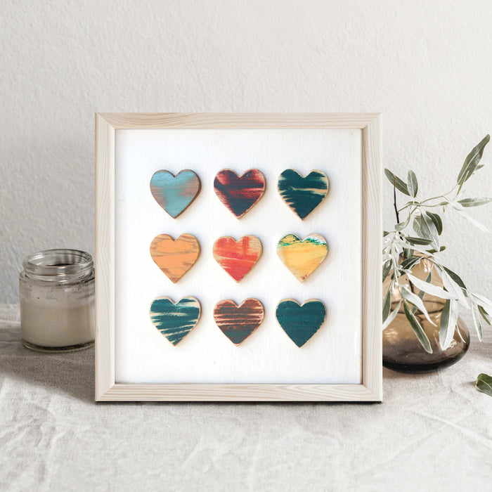 Heart Grid art print showing a three-by-three arrangement of colorful hearts.