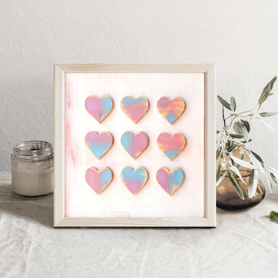 Heart Grid art print showing a three-by-three arrangement of colorful hearts.
