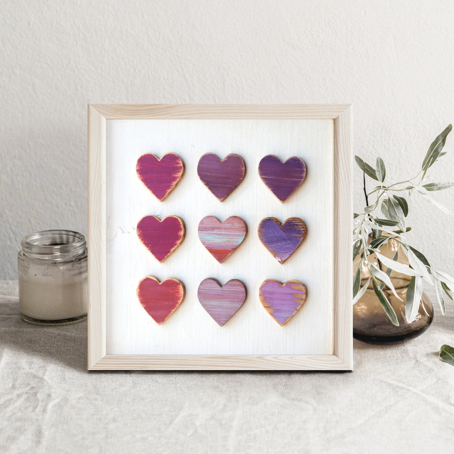 Heart Grid art print showing a three-by-three arrangement of colorful hearts.