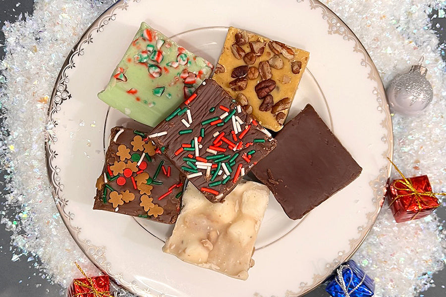 Six holiday fudge varieties arranged on a plate