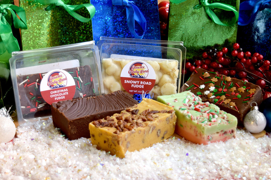 Holiday fudge slices and packages arranged with seasonal decorations