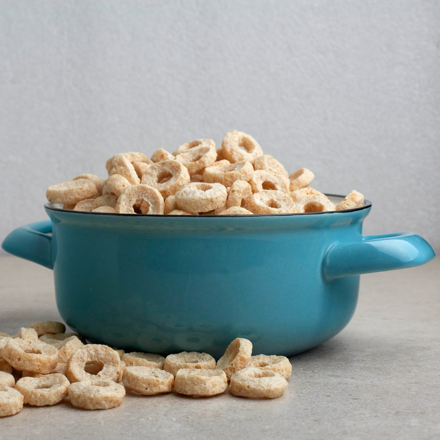 Honey Nut Protein Cereal: dry cereal in a blue bowl.