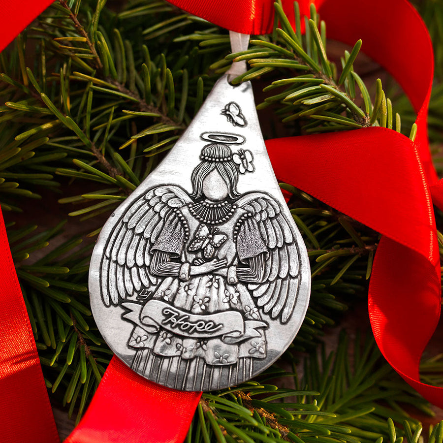 Styled display featuring Hope Angel Teardrop Ornament