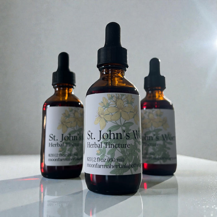 St. John’s wort herbal tincture in amber dropper bottles