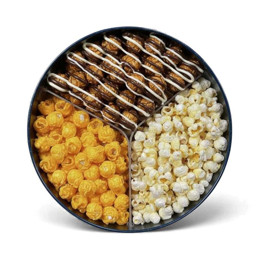 Open tin with chocolate-drizzled caramel, cheddar, and butter popcorn compartments