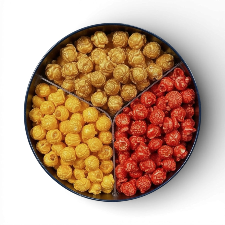 Open tin with caramel, Hot Cheddar, and cheddar popcorn compartments