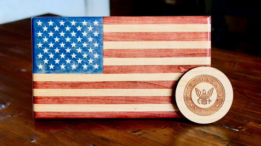 Wooden desktop American flag shown beside a round coaster