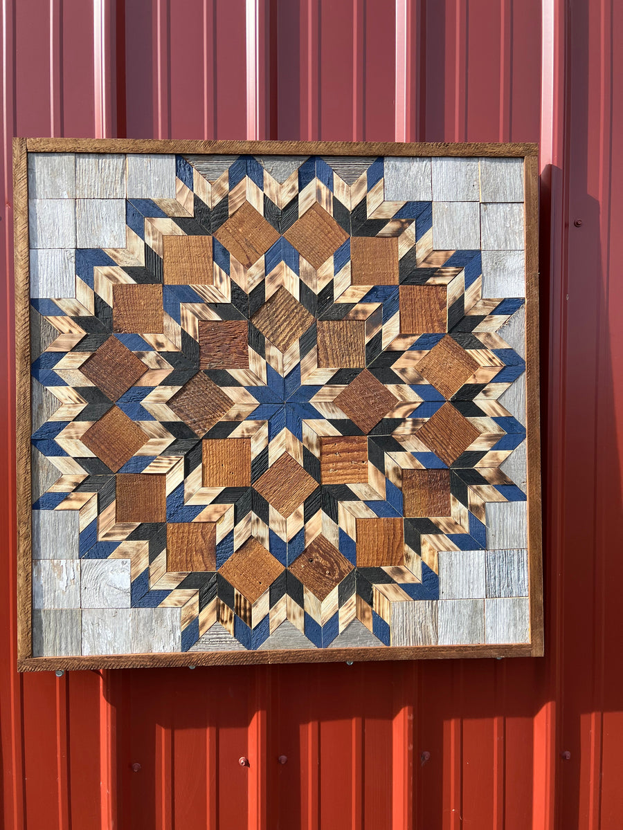 Individual reclaimed-wood barn quilt with a hand-painted geometric star design