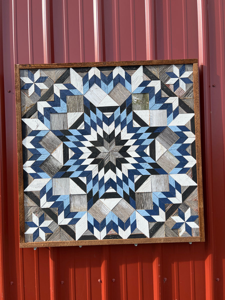 Individual reclaimed-wood barn quilt with a hand-painted geometric star design