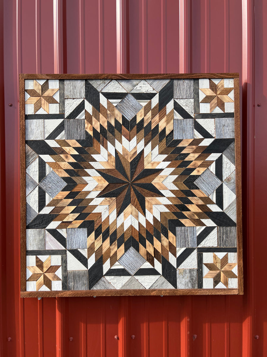 Individual reclaimed-wood barn quilt with a hand-painted geometric star design