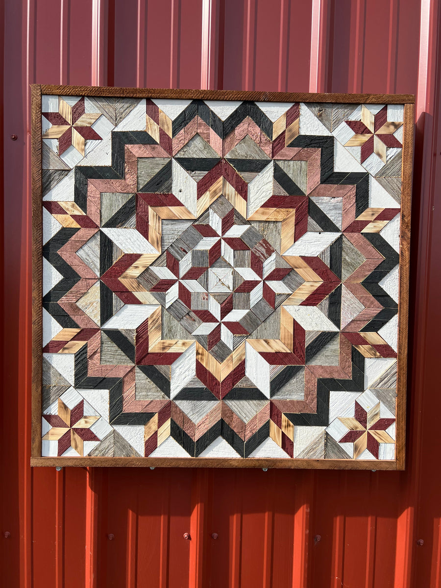 Individual reclaimed-wood barn quilt with a hand-painted geometric star design