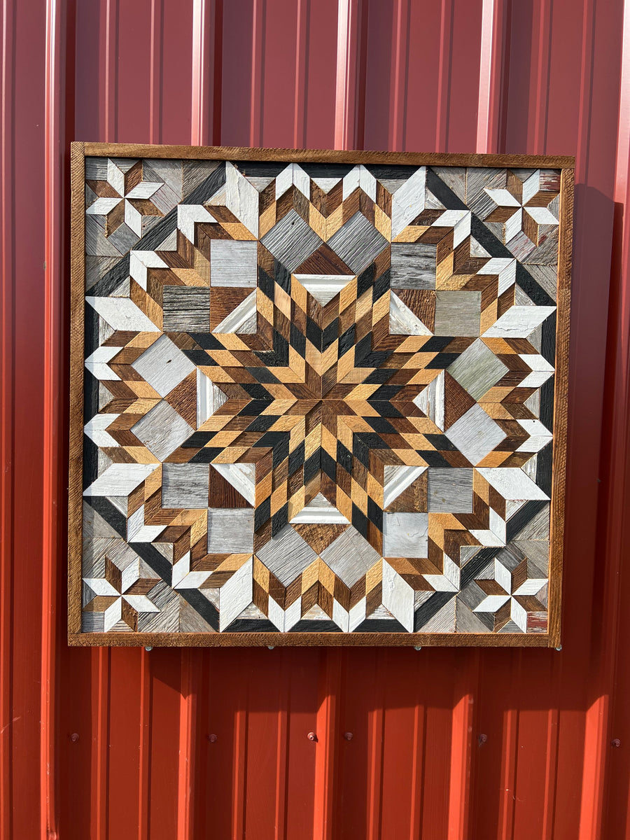Individual reclaimed-wood barn quilt with a hand-painted geometric star design
