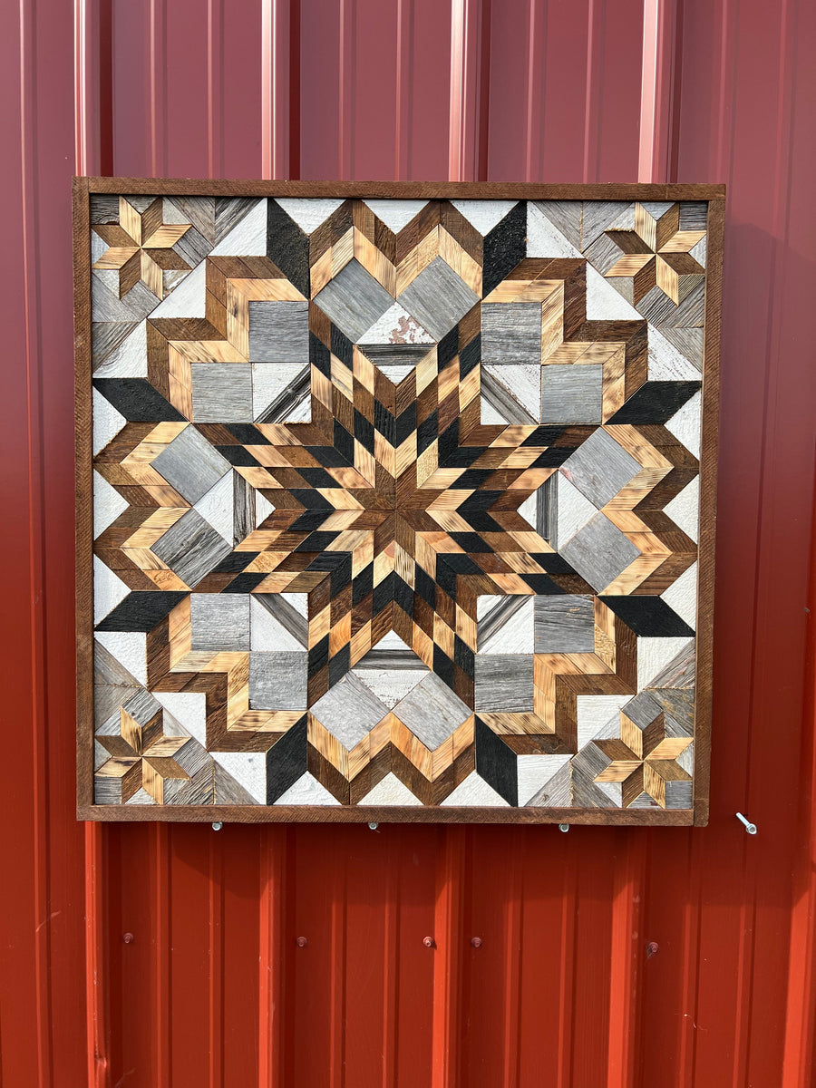 Individual reclaimed-wood barn quilt with a hand-painted geometric star design