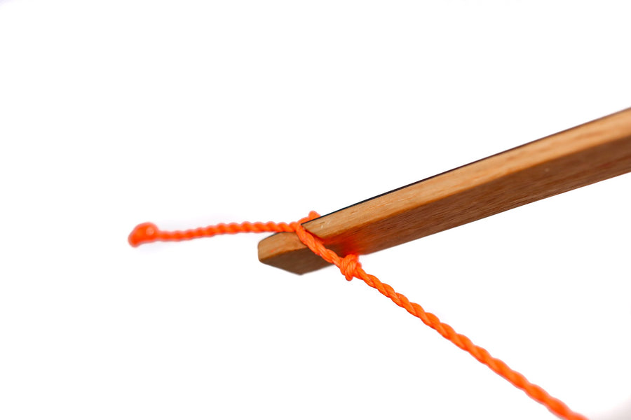 Adjustable Flemish Twist Tillering String for Bow Making — orange tillering-string knot at bow tip