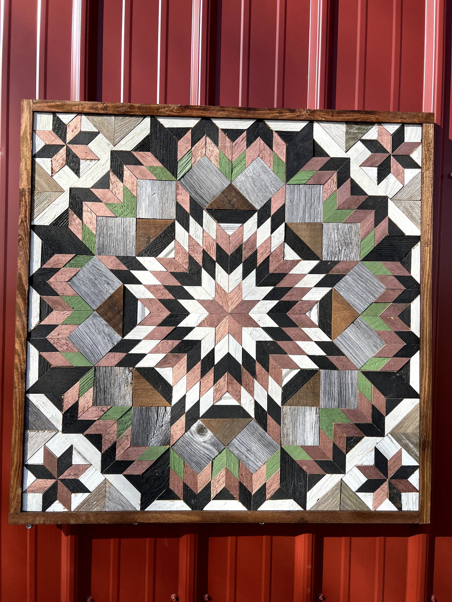 Individual reclaimed-wood barn quilt with a hand-painted geometric star design
