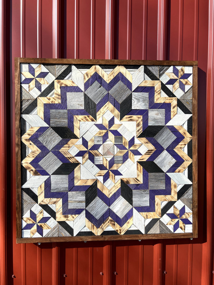 Individual reclaimed-wood barn quilt with a hand-painted geometric star design