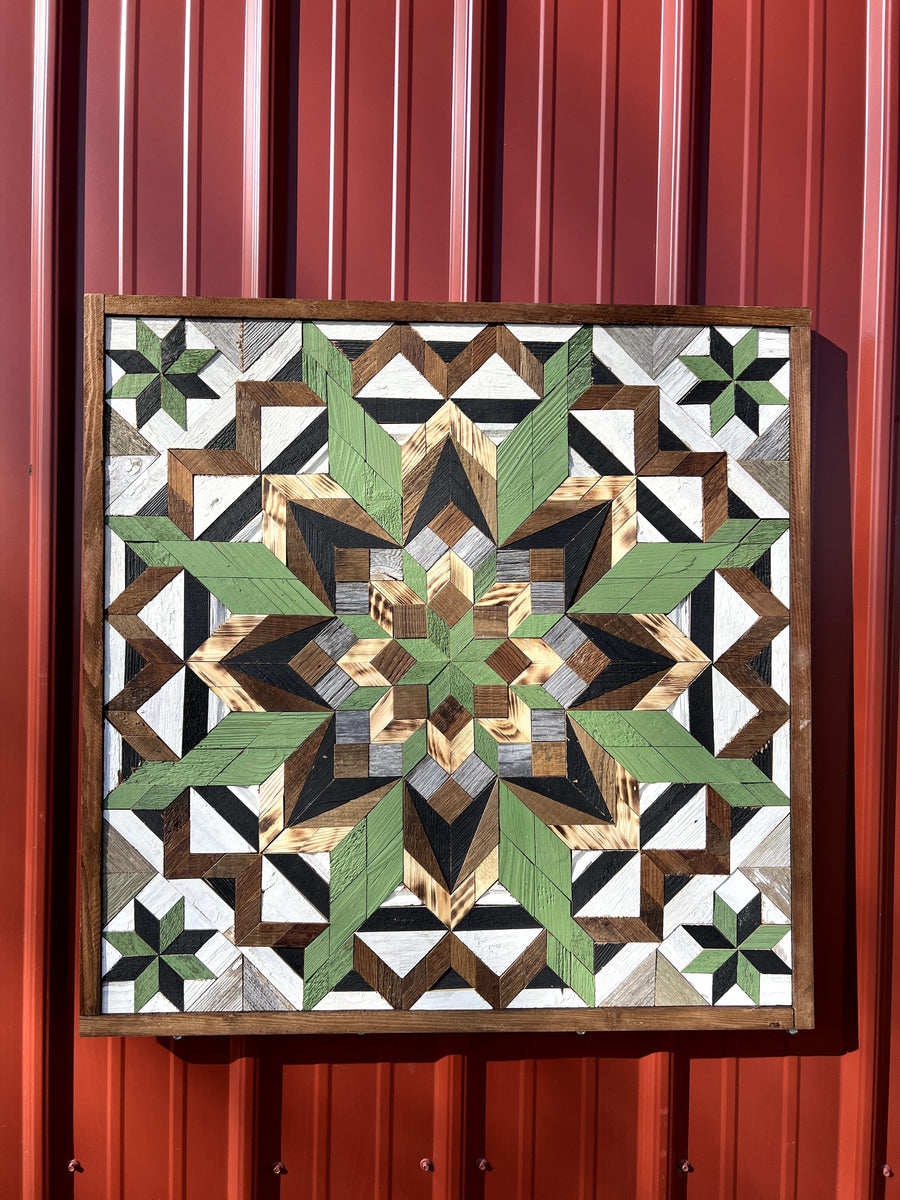 Individual reclaimed-wood barn quilt with a hand-painted geometric star design