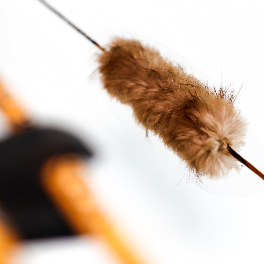 Beaver Fur Bowstring Silencers — beaver-fur silencer installed on string