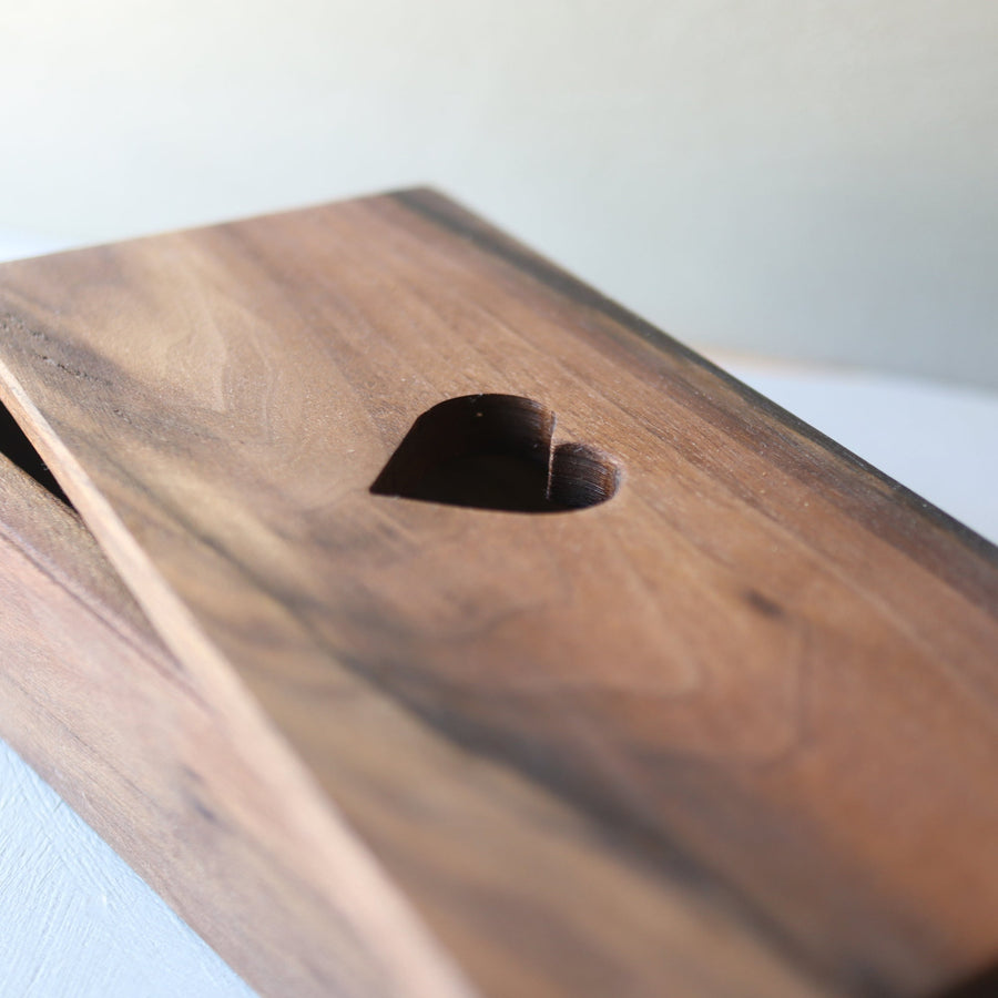 Hardwood keepsake box with a heart-shaped opening in the lid.