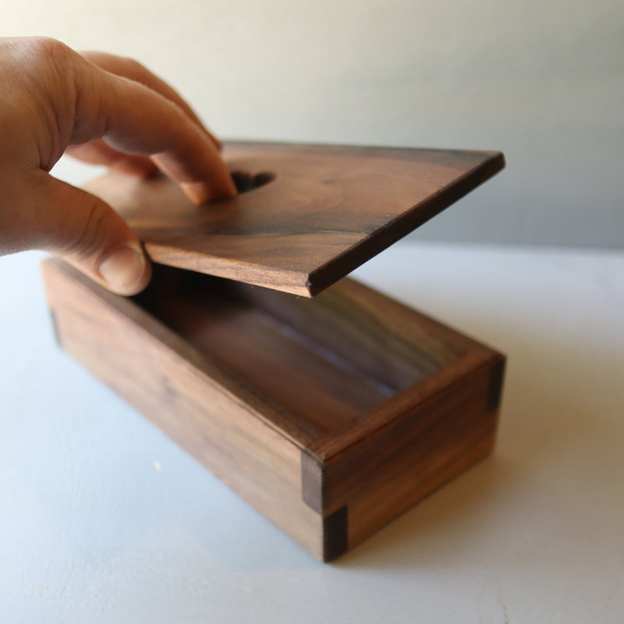 Hardwood keepsake box with a heart-shaped opening in the lid.