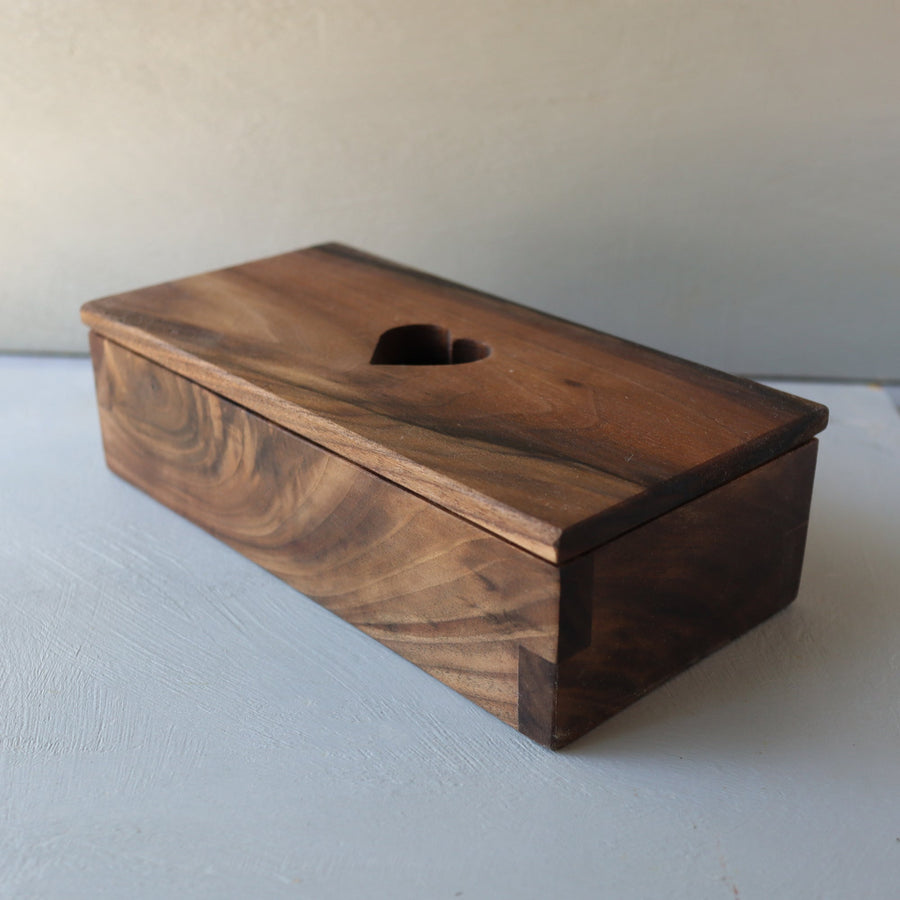 Hardwood keepsake box with a heart-shaped opening in the lid.