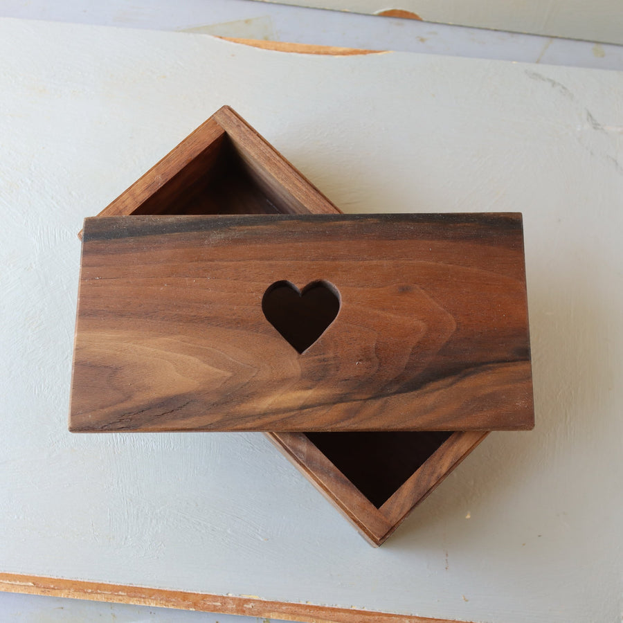 Hardwood keepsake box with a heart-shaped opening in the lid.