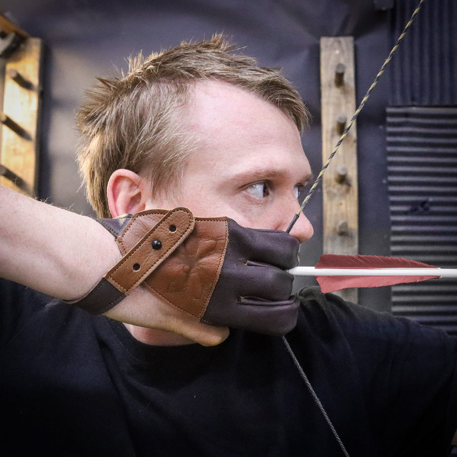 Leather Archery Shooting Glove — glove worn at full draw