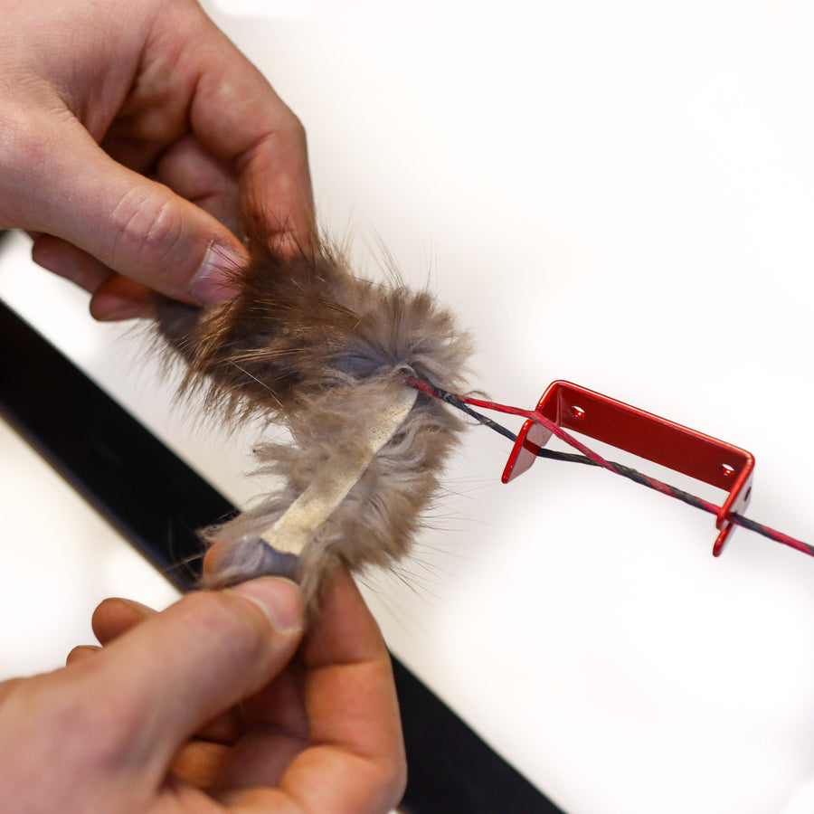 Beaver Fur Bowstring Silencers — installation with optional red separator