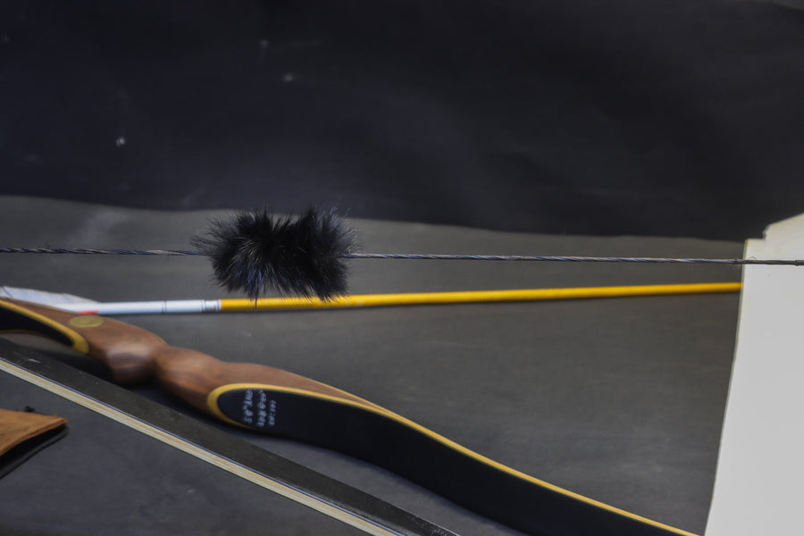 Black Rabbit Fur Bowstring Silencers — bow with rabbit-fur string silencer