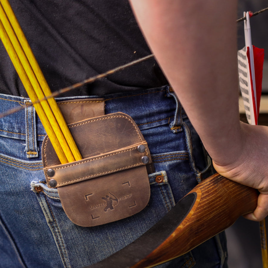 Leather Pocket Arrow Quiver — pocket quiver worn while drawing a bow