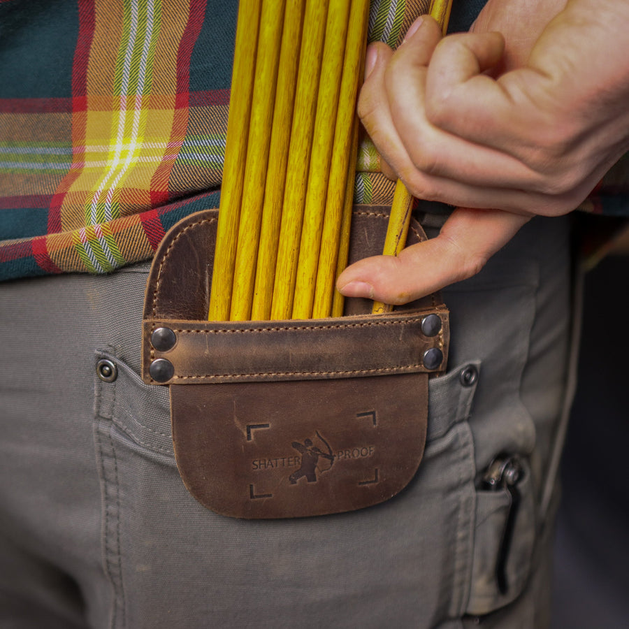 Leather Pocket Arrow Quiver — hand reaching into pocket quiver