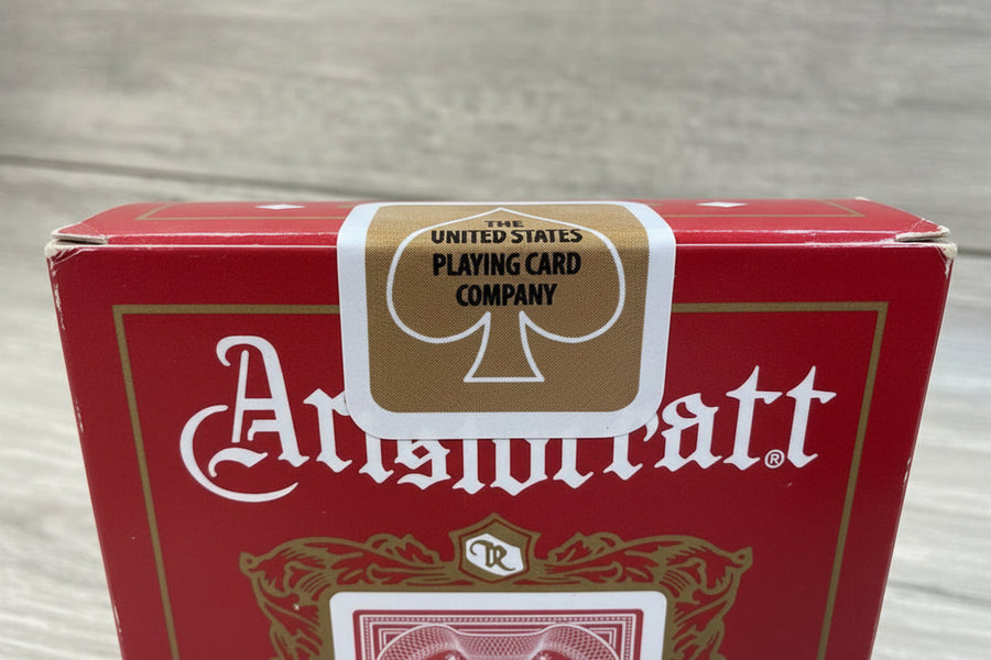 Close-up of the Crimson Aristocrat tuck and anniversary seal