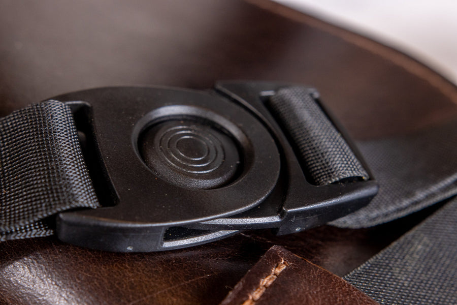 Leather Rear-Facing Hip Arrow Quiver — leg-strap buckle close-up
