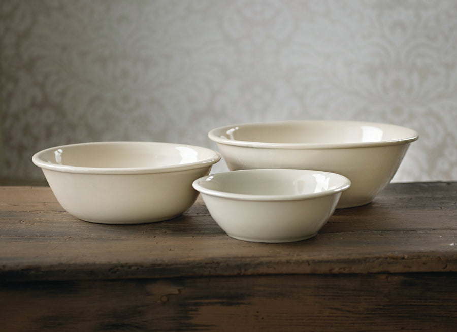 Three Bristol stoneware serving bowls arranged side by side