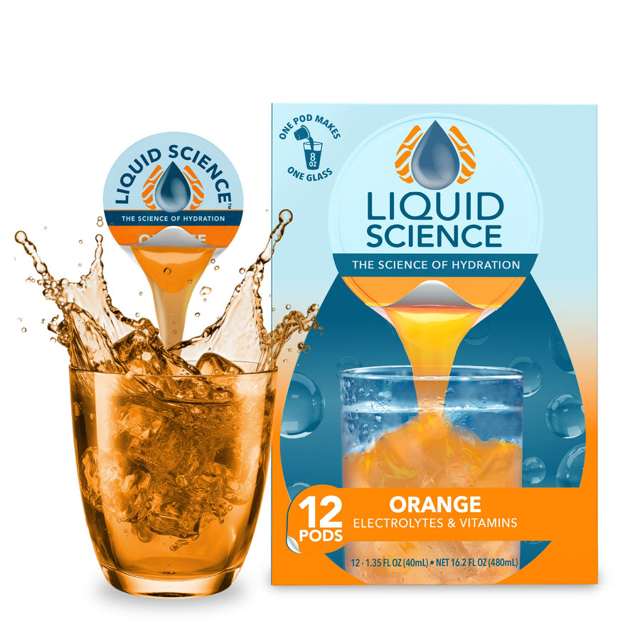 Liquid Science Orange carton and pod beside a drink