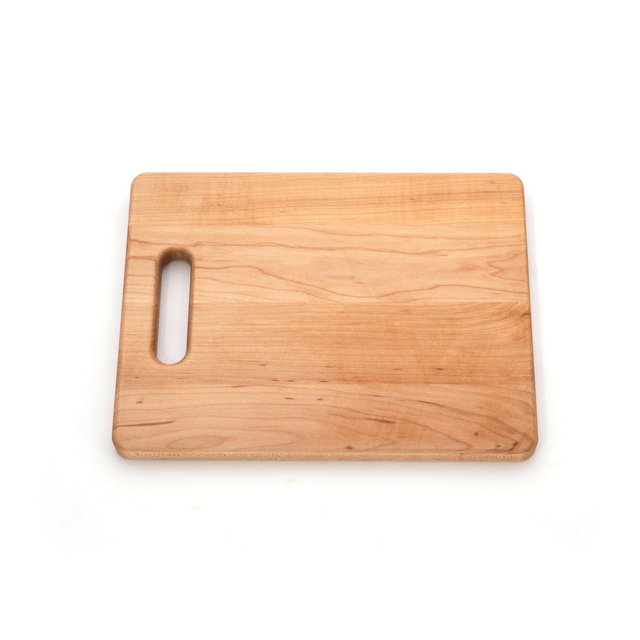 Maple cutting board with one handle shown at an angle