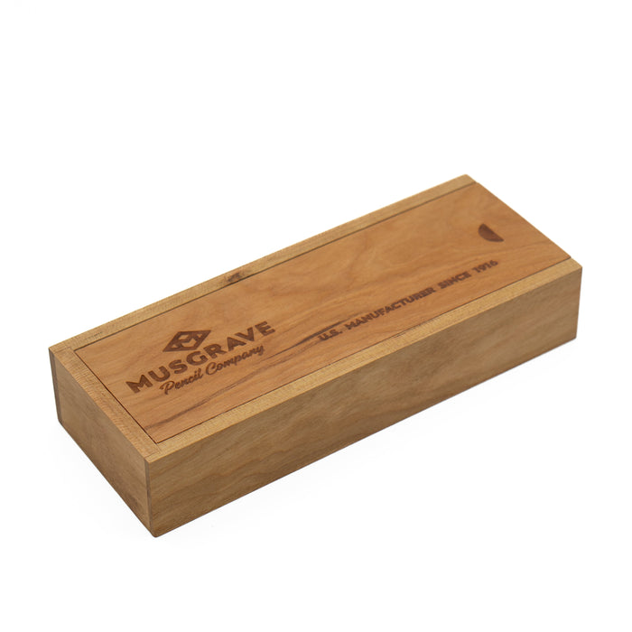 Closed cherry wood Harvest Professional pencil box with engraved lid