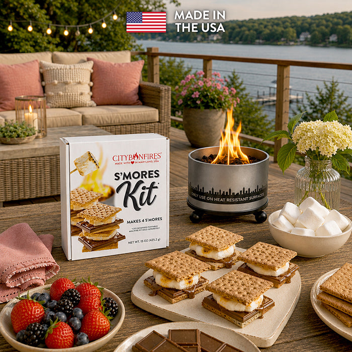 S’mores ingredient kit beside a separate outdoor bonfire