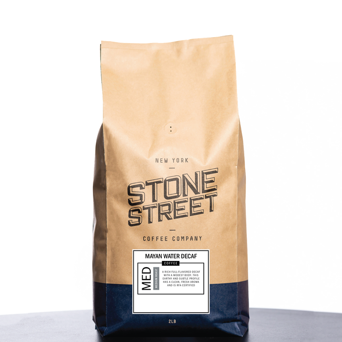 Front of the Stone Street Mayan Water Decaf coffee bag with its product label visible