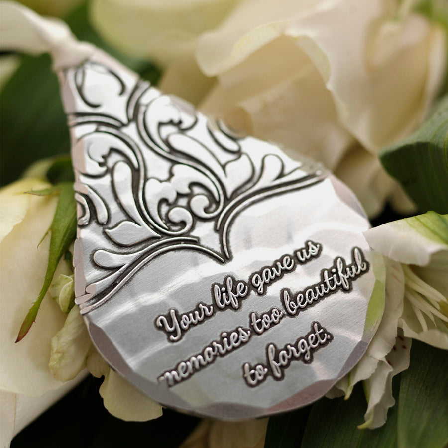 Styled display featuring Teardrop Memorial Ornament