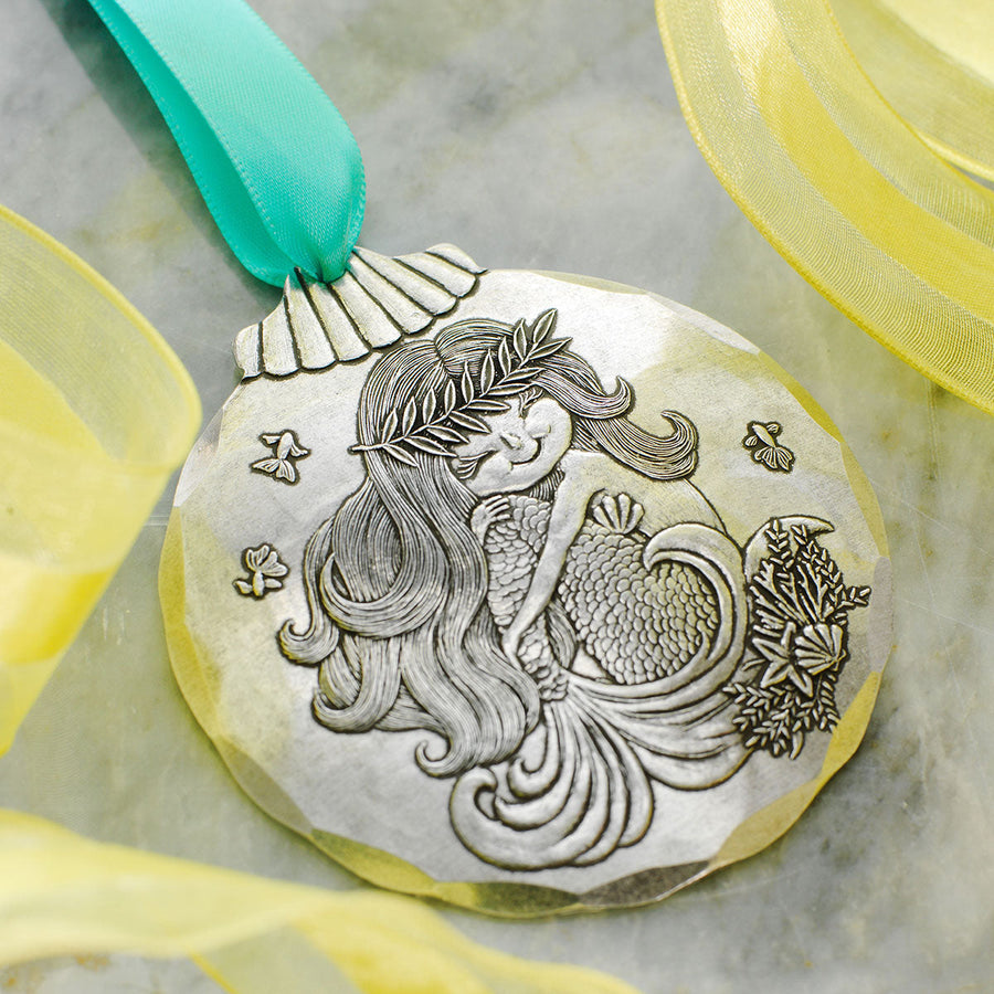 Styled display featuring Mermaid Magic Ornament